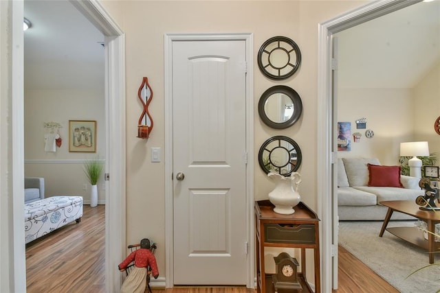 2221 NW 158th St, Edmond, OK 73013 - hall with wood finished floors and baseboards