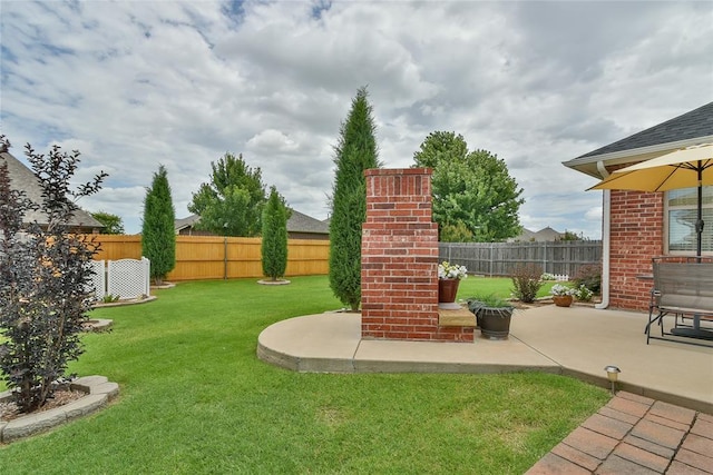 2221 NW 158th St, Edmond, OK 73013 - fenced backyard with a patio
