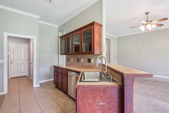 4605 Mackenzie Dr, Moore, OK 73160 - kitchen with stainless steel dishwasher, ceiling fan, decorative backsplash, crown molding, and a peninsula