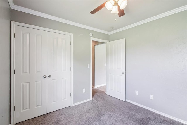 4605 Mackenzie Dr, Moore, OK 73160 - unfurnished bedroom featuring carpet, crown molding, a closet, and a ceiling fan
