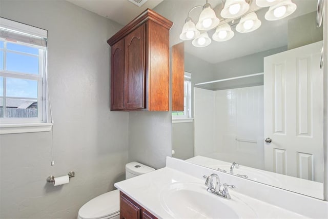 4605 Mackenzie Dr, Moore, OK 73160 - full bathroom featuring vanity and a shower