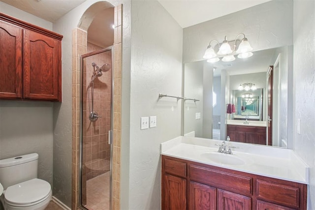 4605 Mackenzie Dr, Moore, OK 73160 - full bath with a textured wall, a shower stall, and vanity