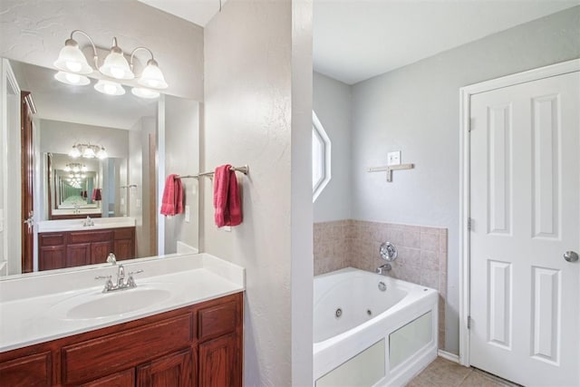 4605 Mackenzie Dr, Moore, OK 73160 - full bath with a tub with jets, vanity, and tile patterned floors