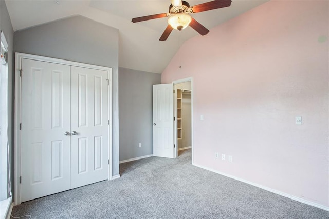 4605 Mackenzie Dr, Moore, OK 73160 - unfurnished bedroom with a closet, vaulted ceiling, carpet flooring, and ceiling fan
