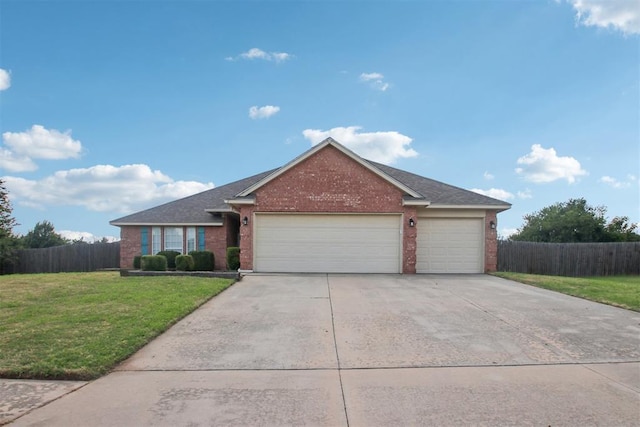 4605 Mackenzie Dr, Moore, OK 73160 - ranch-style house featuring brick siding, an attached garage, concrete driveway, and roof with shingles
