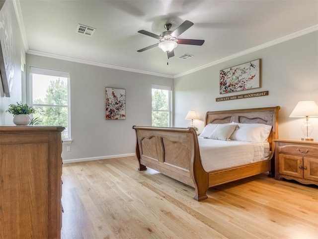 3508 Pavilion Pl, Edmond, OK 73034 - bedroom with light wood finished floors, ornamental molding, and a ceiling fan
