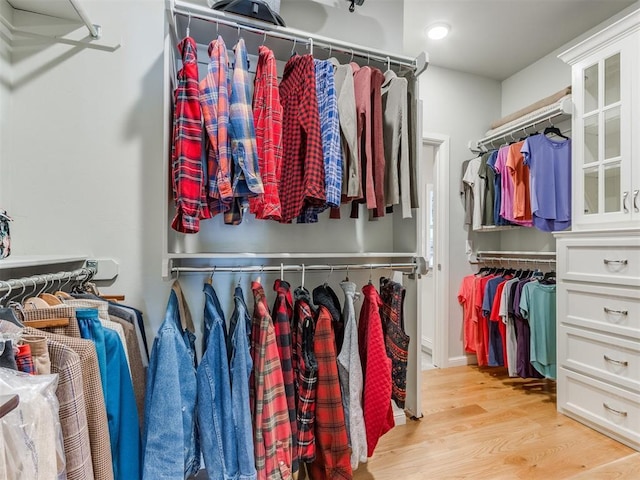 3508 Pavilion Pl, Edmond, OK 73034 - walk in closet with light wood finished floors
