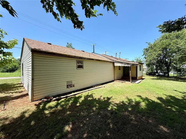 2918 N Prospect Ave, Oklahoma City, OK 73111 - rear view of house with a lawn