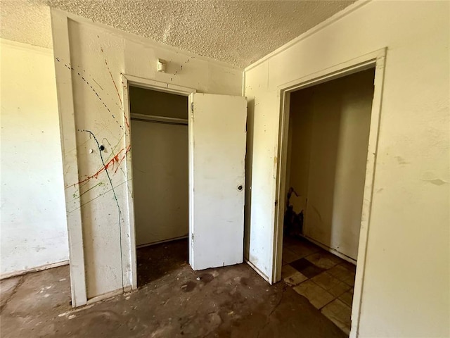 2918 N Prospect Ave, Oklahoma City, OK 73111 - unfurnished bedroom featuring a textured ceiling and a closet