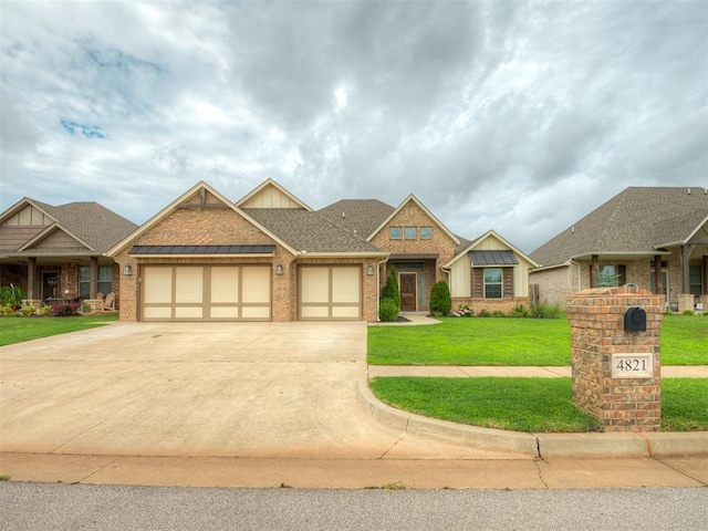 4821 Hidalgo Ave, Mustang, OK 73064 - view of front facade with an attached garage, brick siding, a front yard, driveway, and board and batten siding