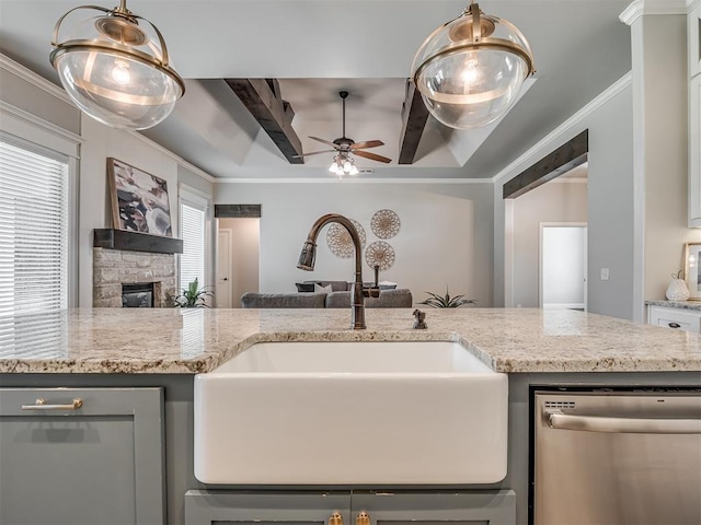 4821 Hidalgo Ave, Mustang, OK 73064 - kitchen featuring stainless steel dishwasher, open floor plan, a tray ceiling, a stone fireplace, and crown molding