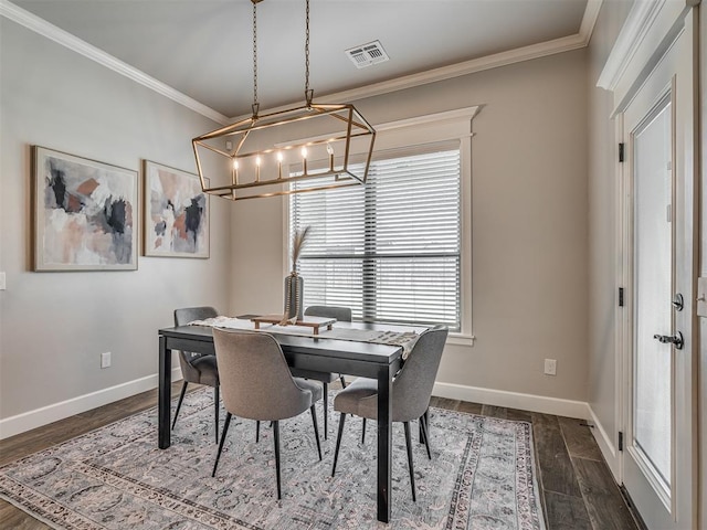 4821 Hidalgo Ave, Mustang, OK 73064 - dining room with a chandelier, crown molding, and dark wood-style flooring