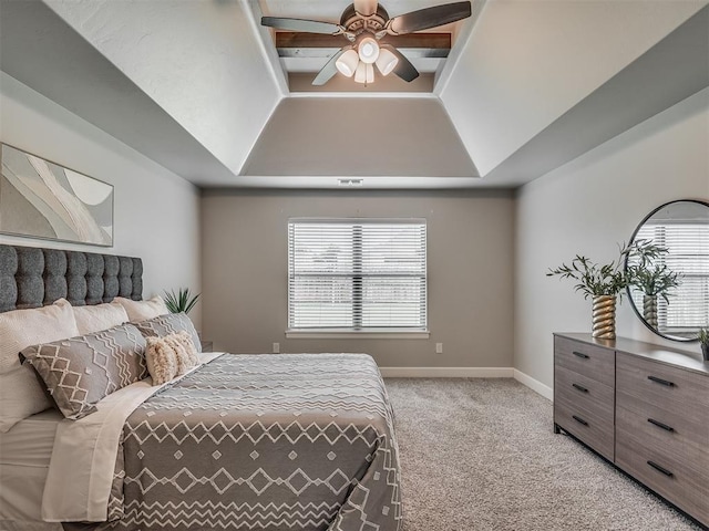 4821 Hidalgo Ave, Mustang, OK 73064 - bedroom with light colored carpet, ceiling fan, and a tray ceiling