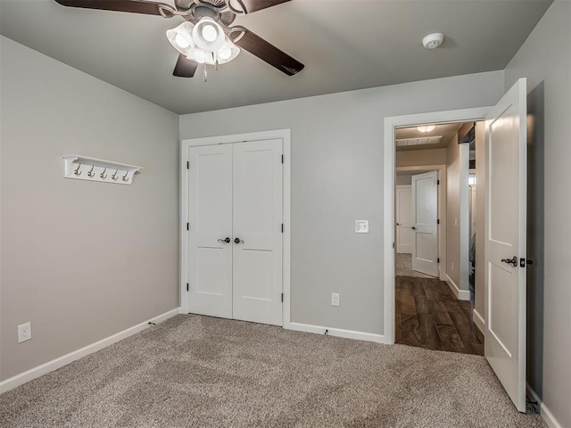 4821 Hidalgo Ave, Mustang, OK 73064 - unfurnished bedroom with carpet flooring, a closet, and a ceiling fan