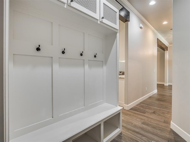 4821 Hidalgo Ave, Mustang, OK 73064 - mudroom with wood finished floors, recessed lighting, and ornamental molding
