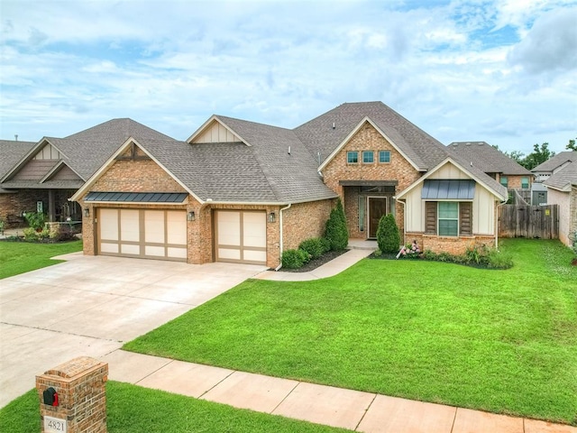 4821 Hidalgo Ave, Mustang, OK 73064 - craftsman-style home with board and batten siding, an attached garage, concrete driveway, brick siding, and a shingled roof