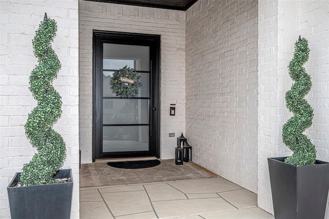 2916 Wood Thrush Way, Edmond, OK 73012 - view of exterior entry with brick siding