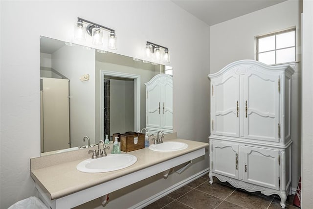 2916 Wood Thrush Way, Edmond, OK 73012 - bathroom featuring double vanity and tile patterned flooring