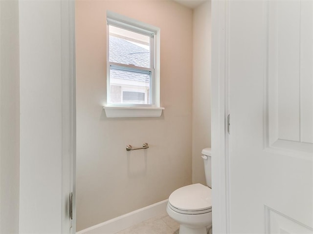 9313 NW 141st St, Yukon, OK 73099 - bathroom featuring toilet and tile patterned flooring