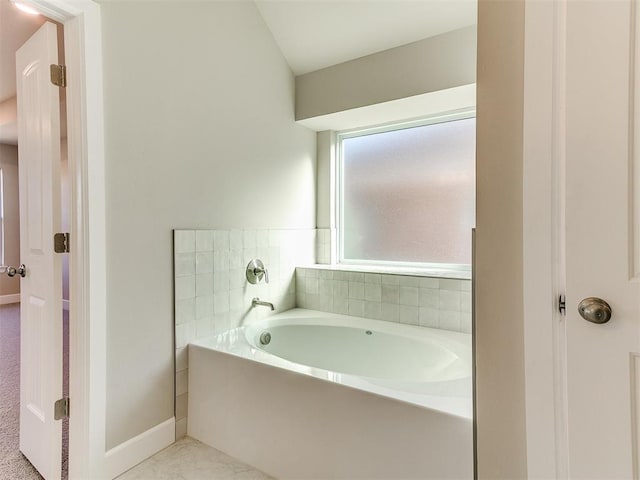 9313 NW 141st St, Yukon, OK 73099 - full bathroom featuring a bath and baseboards