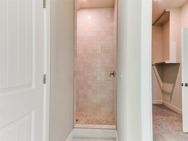9313 NW 141st St, Yukon, OK 73099 - full bathroom featuring a tile shower and baseboards