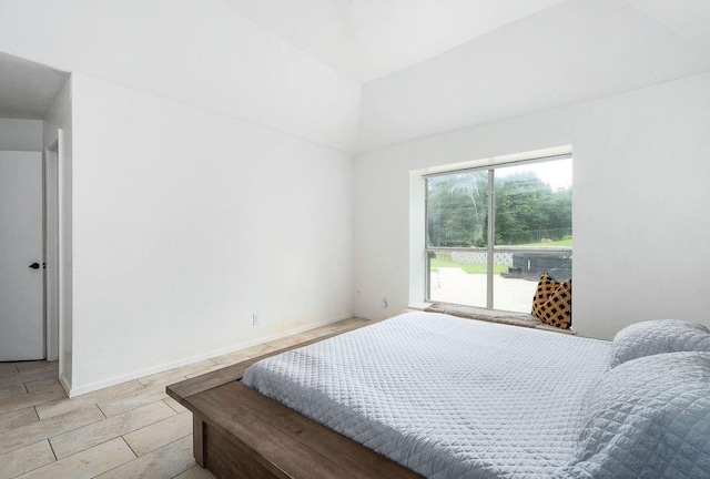 13848 Twin Ridge Dr, Edmond, OK 73034 - bedroom with access to exterior and lofted ceiling