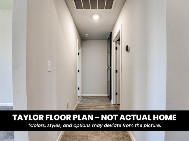 2508 Marsh Ln, Midwest City, OK 73130 - hallway with wood finished floors and baseboards