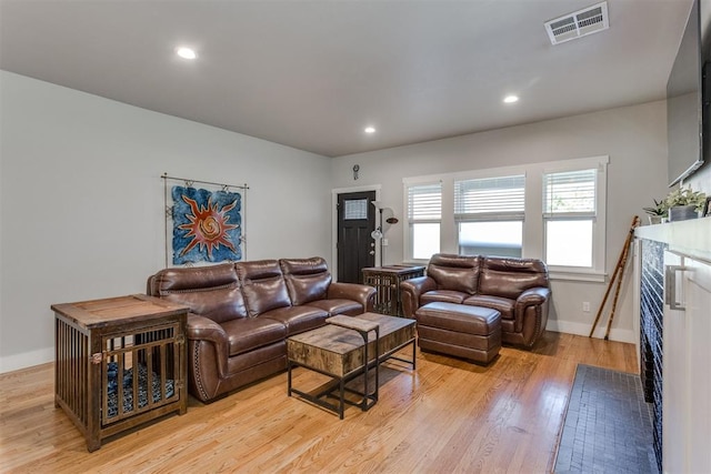 3424 NW 16th St, Oklahoma City, OK 73107 - living area with light wood-type flooring and recessed lighting