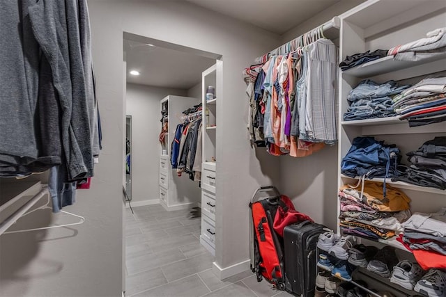 3424 NW 16th St, Oklahoma City, OK 73107 - walk in closet with light tile patterned flooring