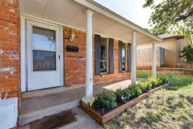 3513 Terry Way, Del City, OK 73115 - property entrance with brick siding and covered porch