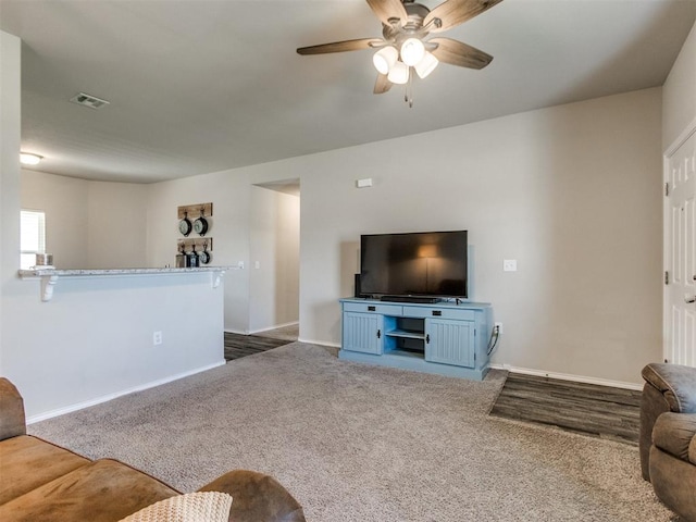 10408 NW 17th St, Oklahoma City, OK 73127 - living area featuring ceiling fan and carpet flooring