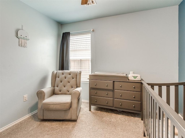 10408 NW 17th St, Oklahoma City, OK 73127 - bedroom featuring a crib and light colored carpet