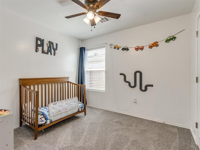 10408 NW 17th St, Oklahoma City, OK 73127 - carpeted bedroom with ceiling fan and baseboards