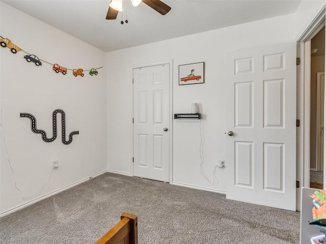 10408 NW 17th St, Oklahoma City, OK 73127 - unfurnished bedroom featuring carpet flooring and ceiling fan