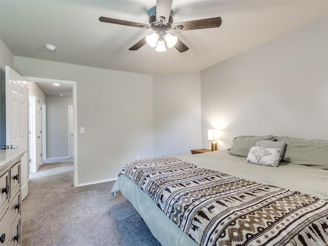 10408 NW 17th St, Oklahoma City, OK 73127 - bedroom with light carpet and ceiling fan