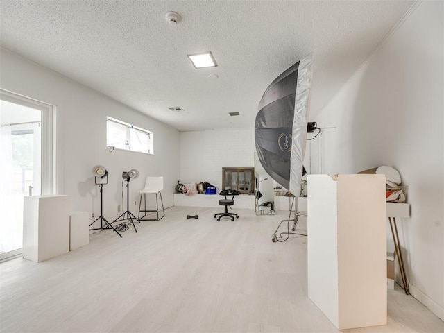 6908 NW 36th St, Bethany, OK 73008 - miscellaneous room with wood finished floors and a textured ceiling