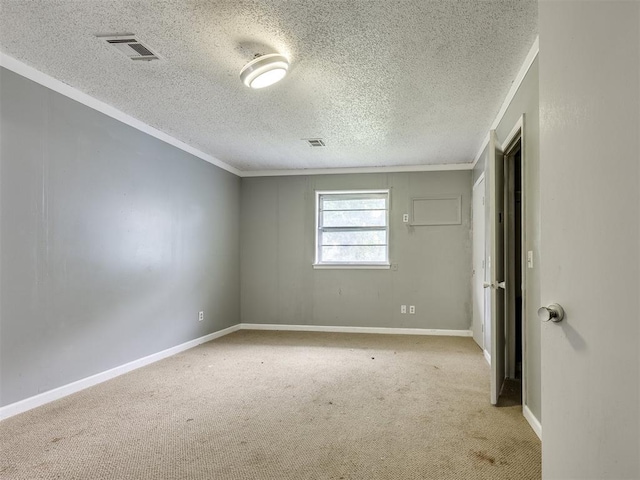 6908 NW 36th St, Bethany, OK 73008 - carpeted spare room with crown molding and a textured ceiling