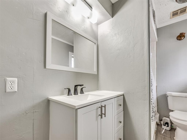 6908 NW 36th St, Bethany, OK 73008 - full bathroom featuring vanity, wood finished floors, and a shower with curtain