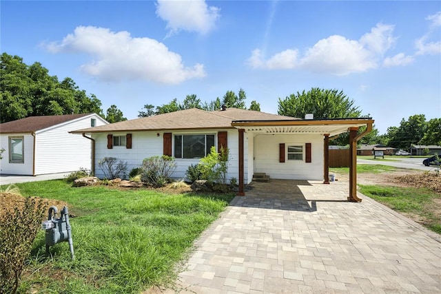 6908 NW 36th St, Bethany, OK 73008 - single story home with a carport, driveway, and a front yard