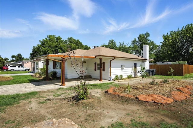 6908 NW 36th St, Bethany, OK 73008 - view of front of home featuring a chimney