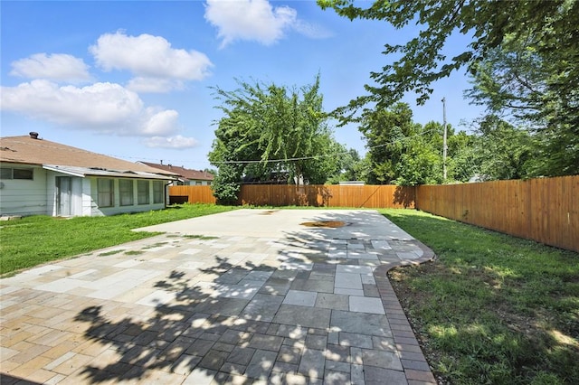 6908 NW 36th St, Bethany, OK 73008 - fenced backyard featuring a patio