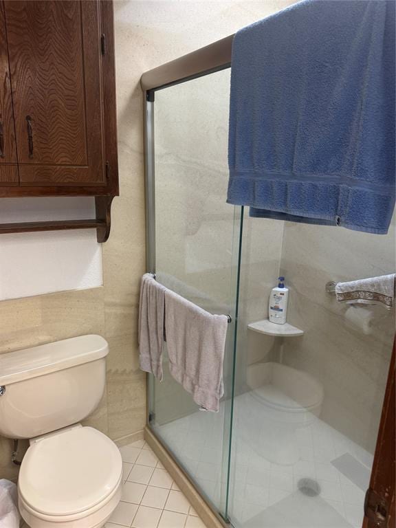 11700 Sierra Rd, Oklahoma City, OK 73162 - bathroom with tile patterned floors and a shower stall