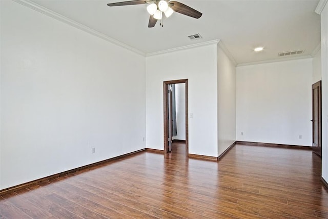 917 Erinova Dr, Yukon, OK 73099 - spare room with crown molding, a ceiling fan, and wood finished floors
