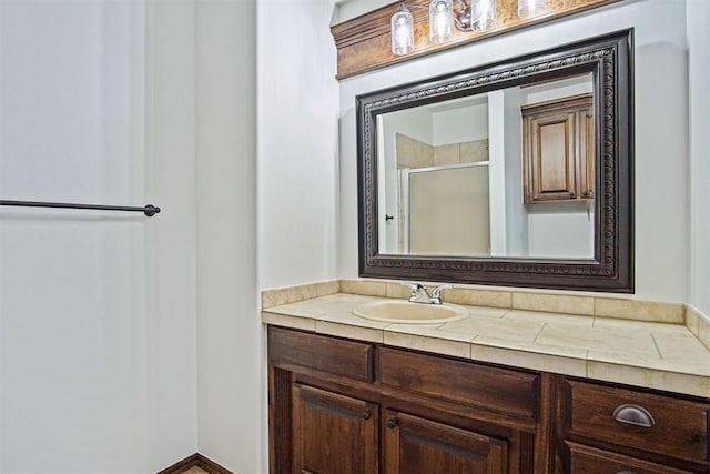 917 Erinova Dr, Yukon, OK 73099 - bathroom featuring a shower stall and vanity