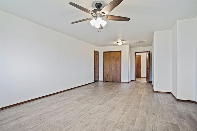 917 Erinova Dr, Yukon, OK 73099 - unfurnished room with light wood finished floors and ceiling fan