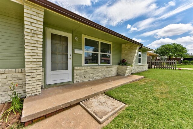 5417 NW 45th Ter, Warr Acres, OK 73122 - view of exterior entry with brick siding
