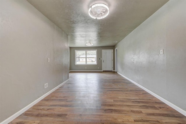 5417 NW 45th Ter, Warr Acres, OK 73122 - spare room featuring wood finished floors