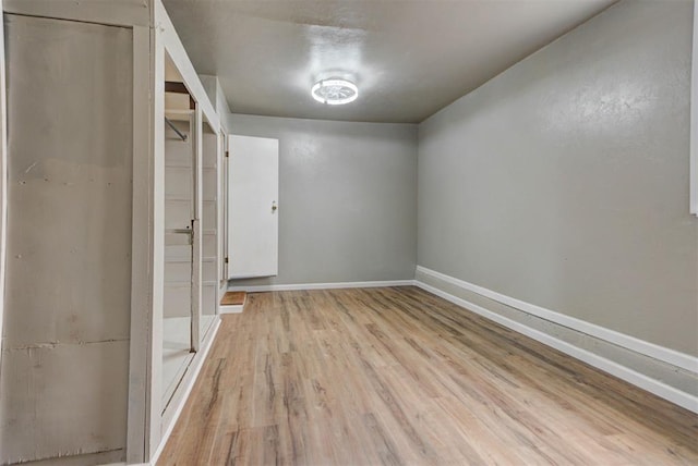 5417 NW 45th Ter, Warr Acres, OK 73122 - spare room featuring wood finished floors and baseboards