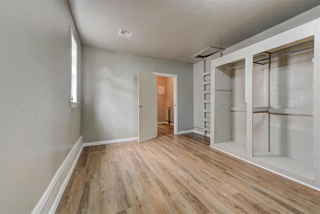 5417 NW 45th Ter, Warr Acres, OK 73122 - unfurnished bedroom with wood finished floors and a closet