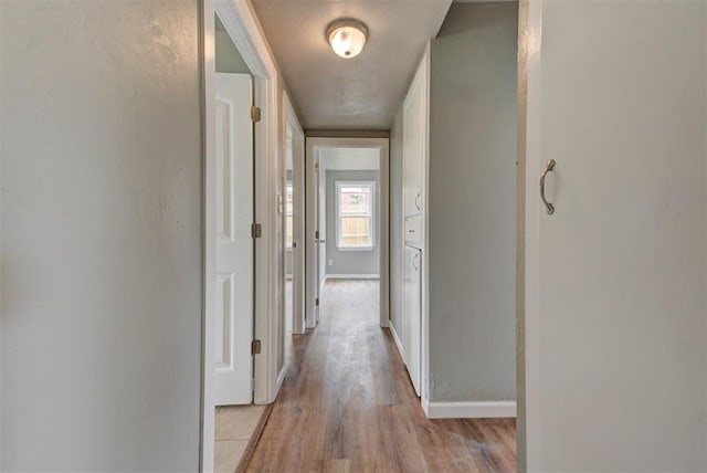 5417 NW 45th Ter, Warr Acres, OK 73122 - hall featuring light wood-style floors and baseboards